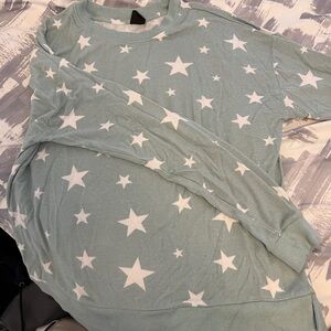 Teal top with white stars